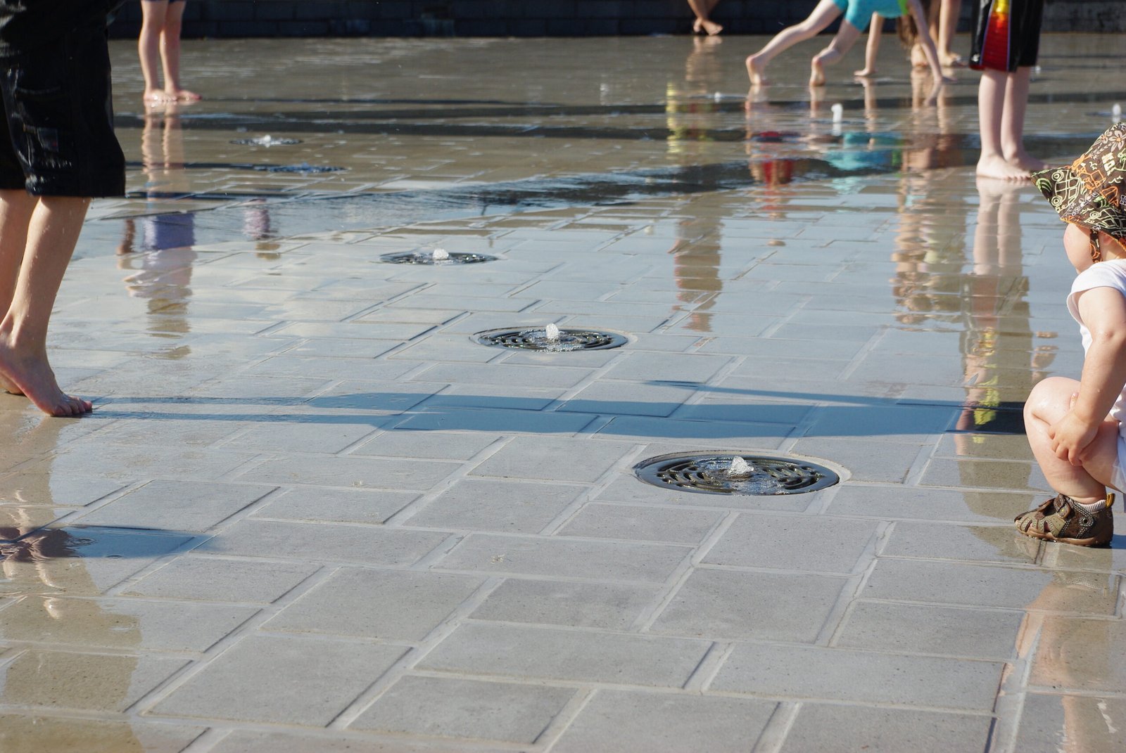 Children playing in the sprayground at Hidden Creek Park East (53rd Avenue Park), Hillsboro